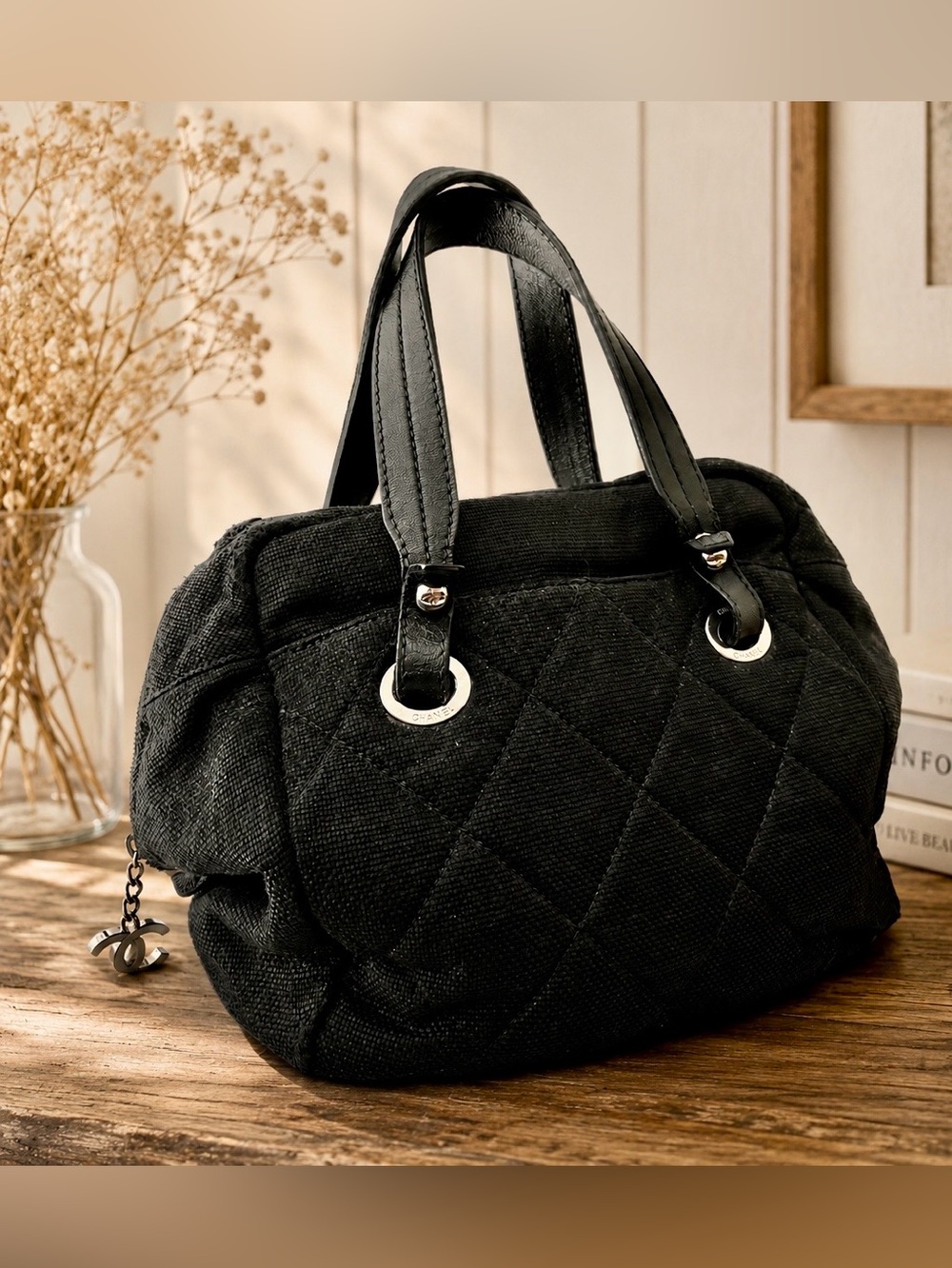 Authentic Chanel Biarritz quilted canvas bowler bag.
